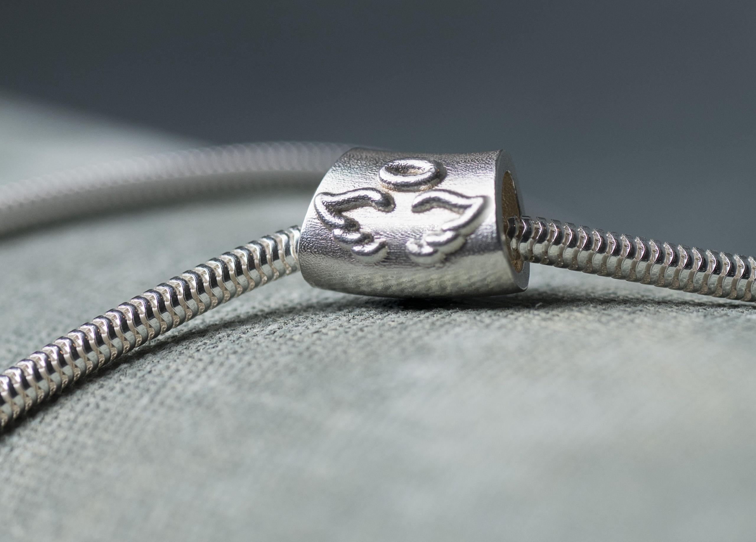 Angel Baby: A Sterling Silver Charm Created in Memory of Avi