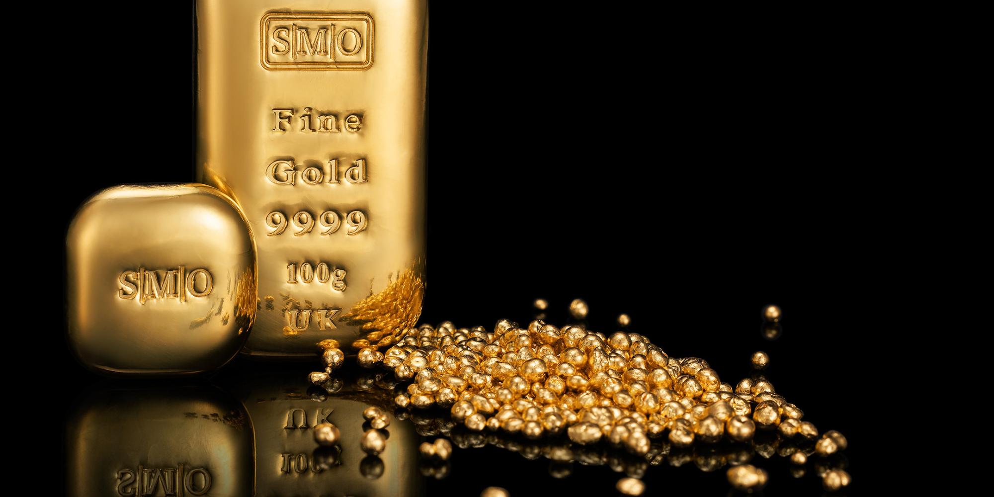 SmoGold 100 gram fine gold bar, gold ingot and gold granules displayed against a black background.