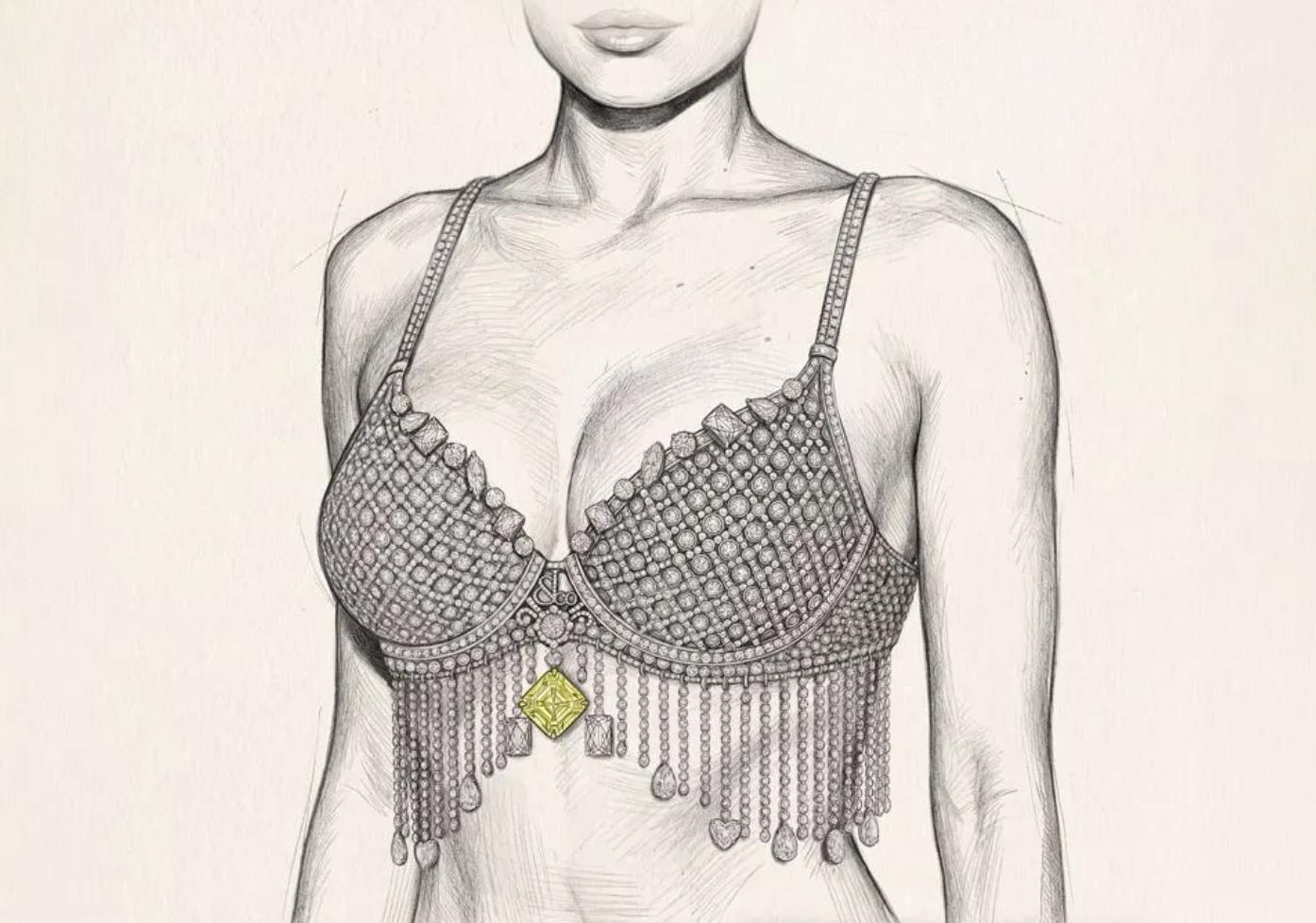 Detailed pencil design sketch of the Angel Fantasy Bra covered in diamonds, with hanging fringe and a yellow diamond at its centre.