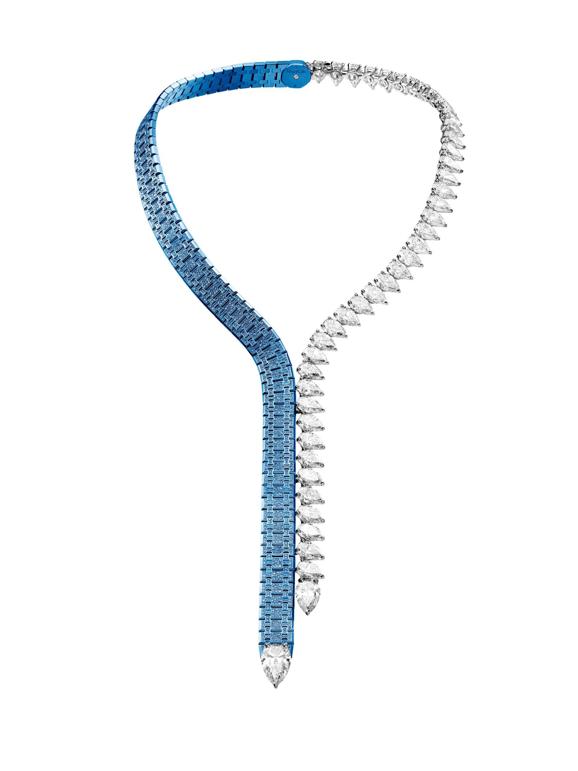 Asymmetric Audemars Piguet necklace with an articulated blue titanium and sapphire strand crossing a graduated row of pear-shaped white diamonds.