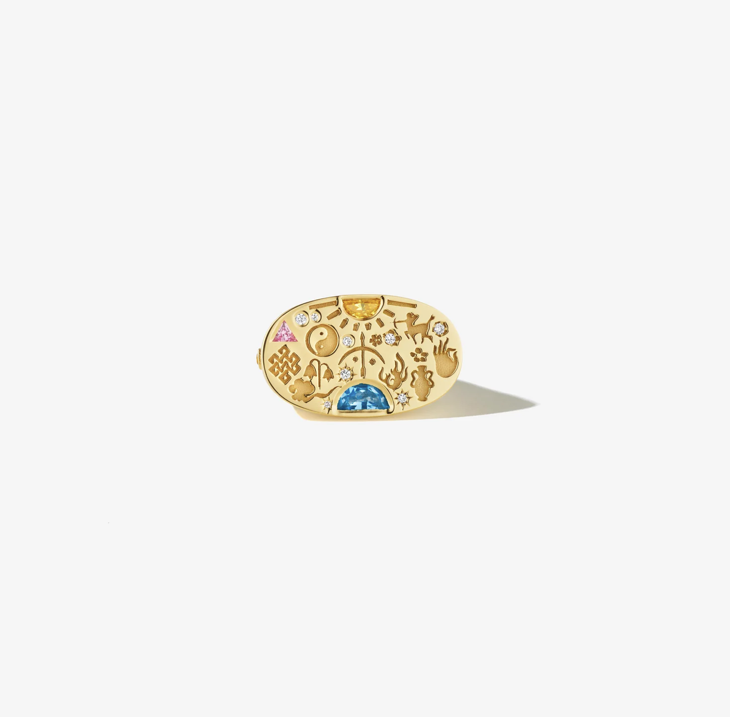 A custom Loverglyphs ring by DYNE, set with sapphires, diamonds and engraved symbols — each glyph a visual chapter in the wearer’s personal story