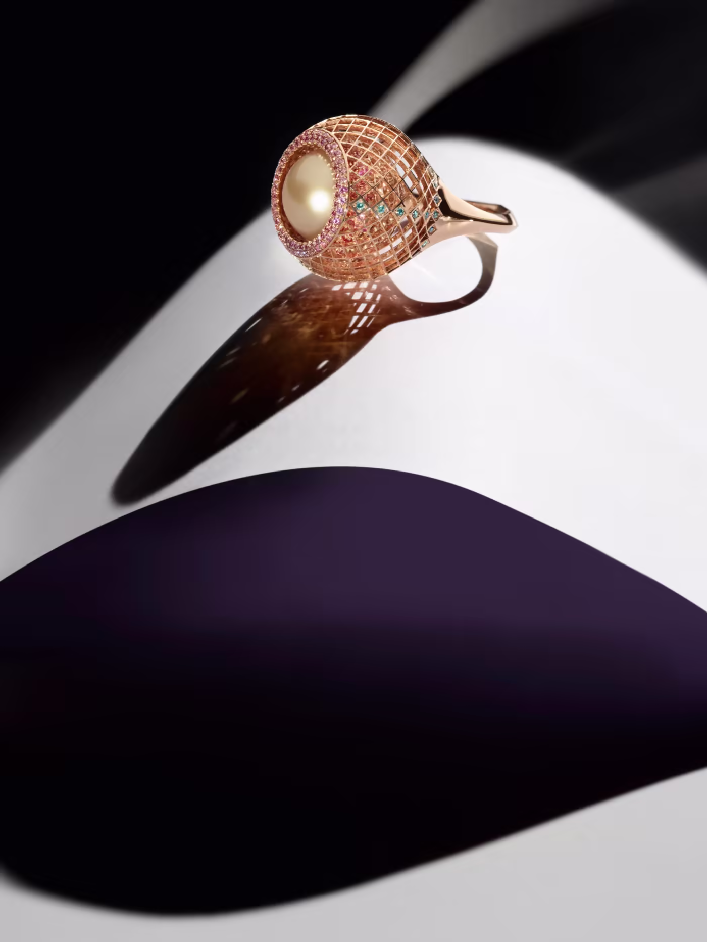 Orb ring in rose gold, set with pink and orange sapphires, pink and green diamonds, and a South Sea pearl – $80,000.