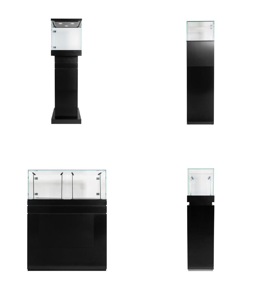 Four Visionary Displays jewellery cabinet options, including three tall black pedestal showcases and a wider glass-topped counter cabinet