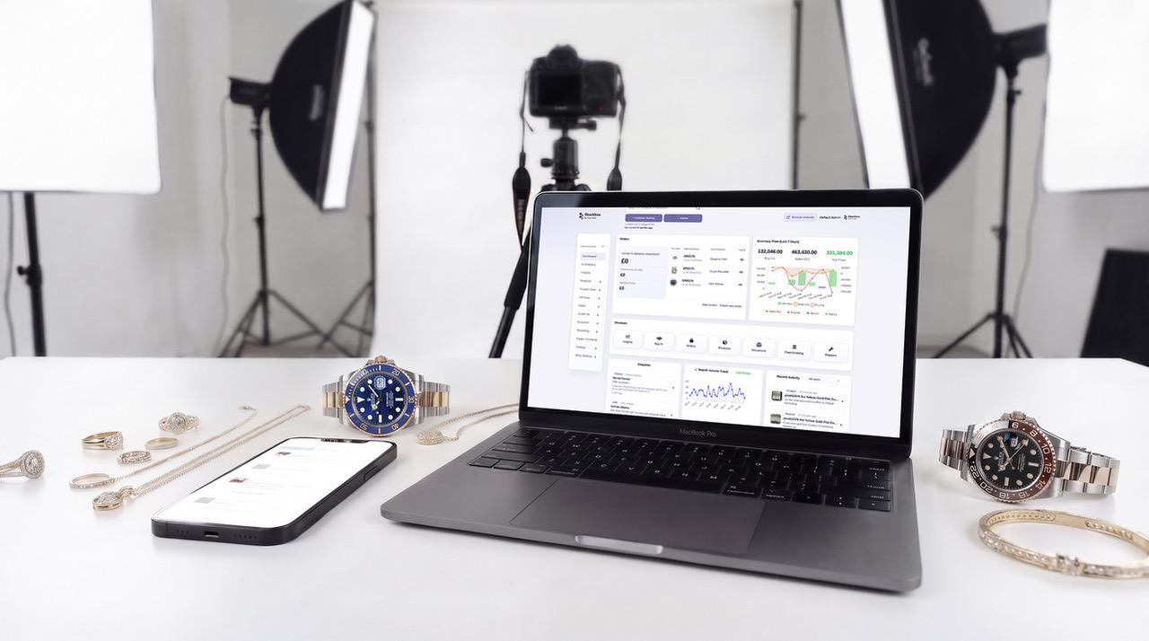 Stockbox retail management dashboard displayed on a desktop, tablet and smartphone inside a jewellery store.