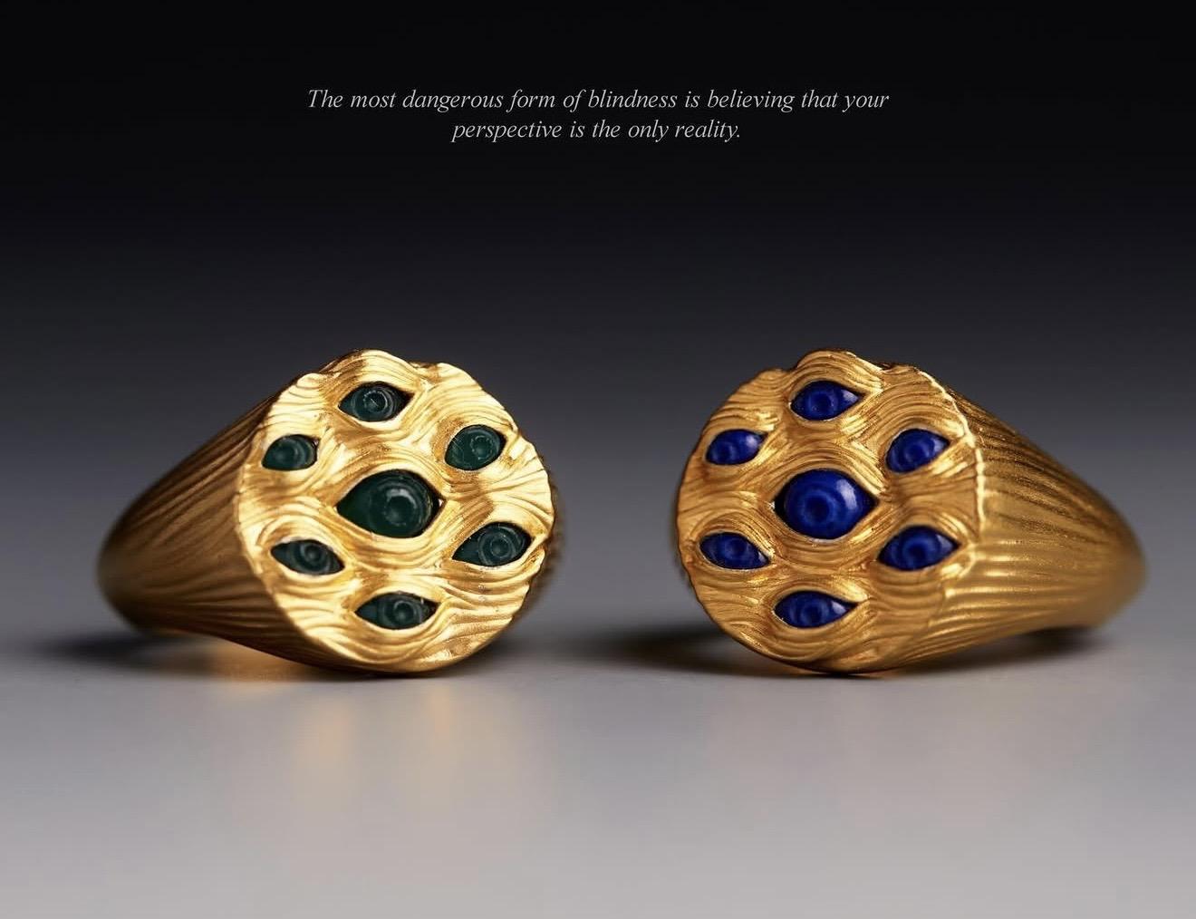 Gold ring from Kasun London’s Eyes of Many collection featuring multiple green agate eye motifs across a textured surface, handcrafted in a bold signet-style design.