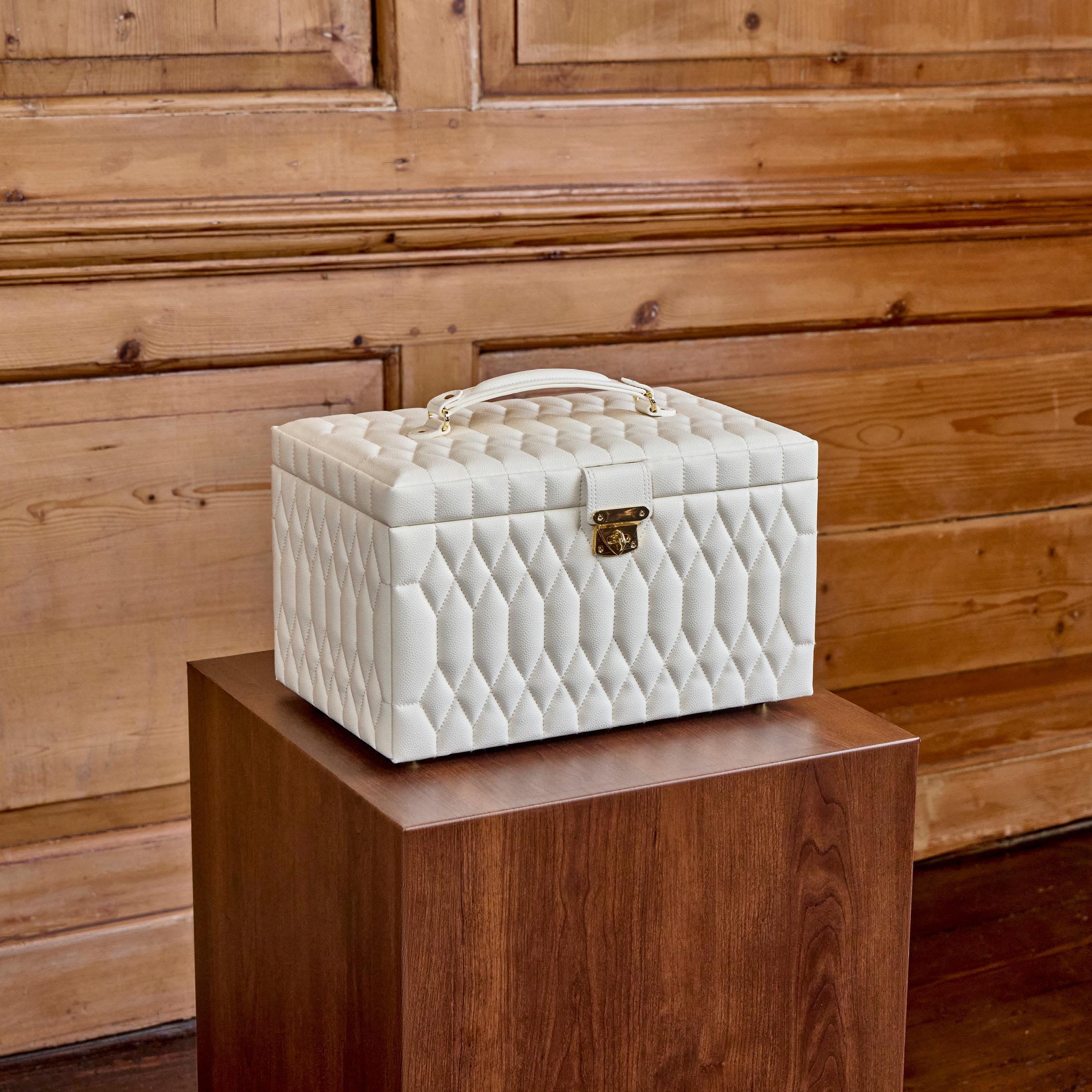 Ivory WOLF Lauren jewellery box with geometric stitching and gold-tone hardware.