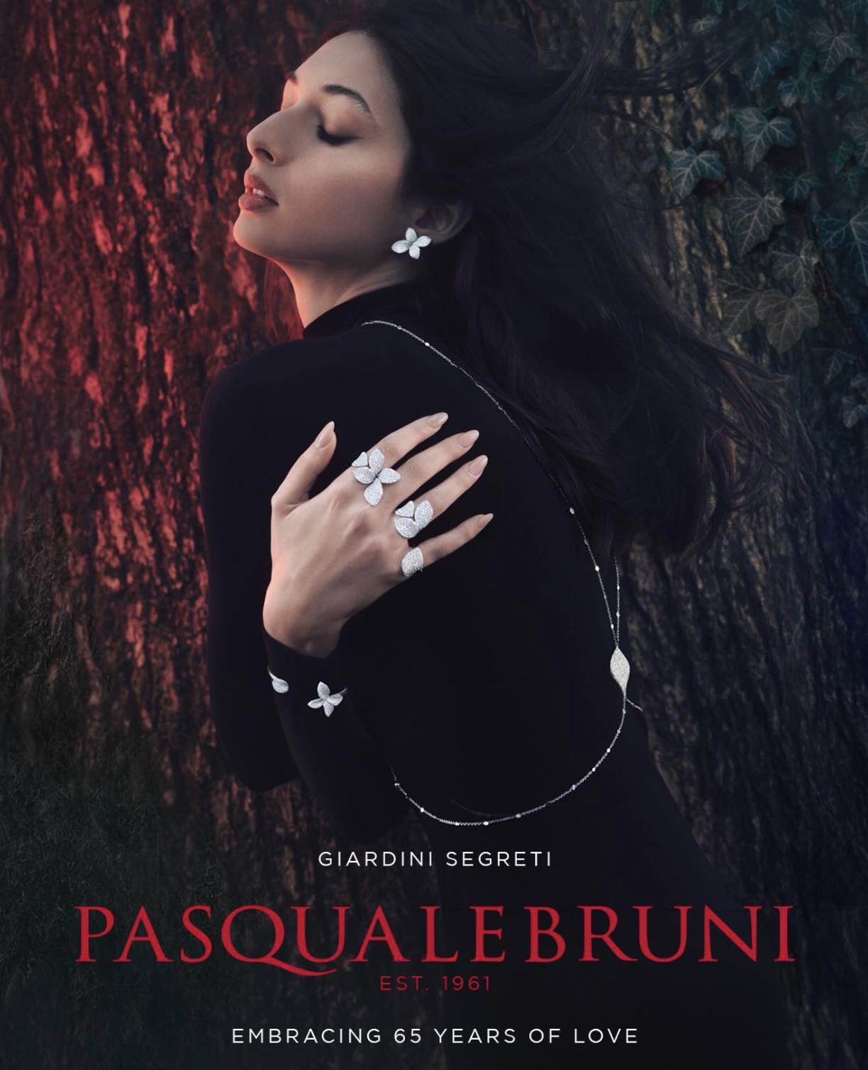 Pasquale Bruni Giardini Segreti campaign image with model wearing floral diamond jewellery in forest setting