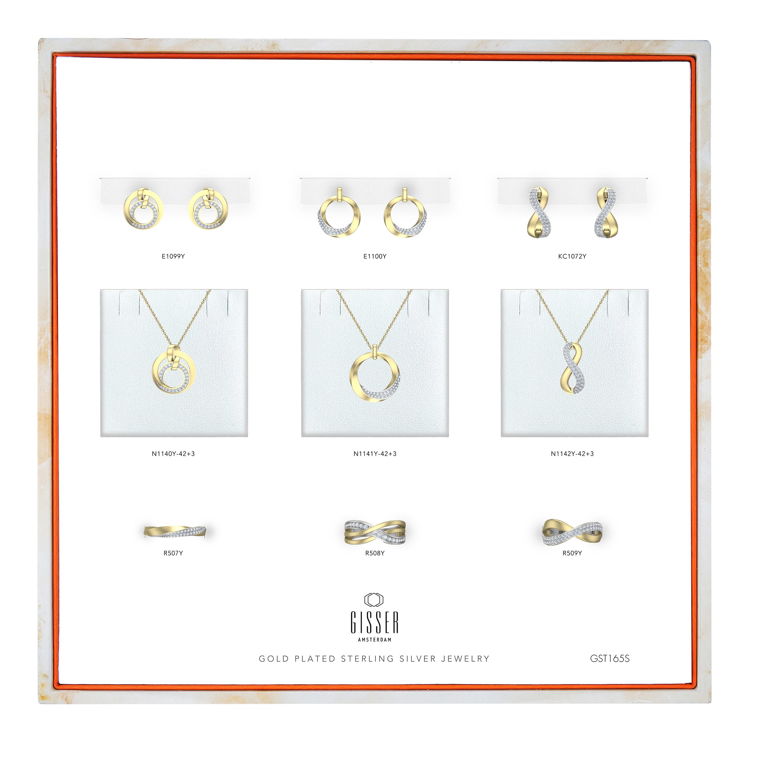 Gisser gold-plated sterling silver jewellery including earrings, necklaces and rings displayed on a branded presentation tray.