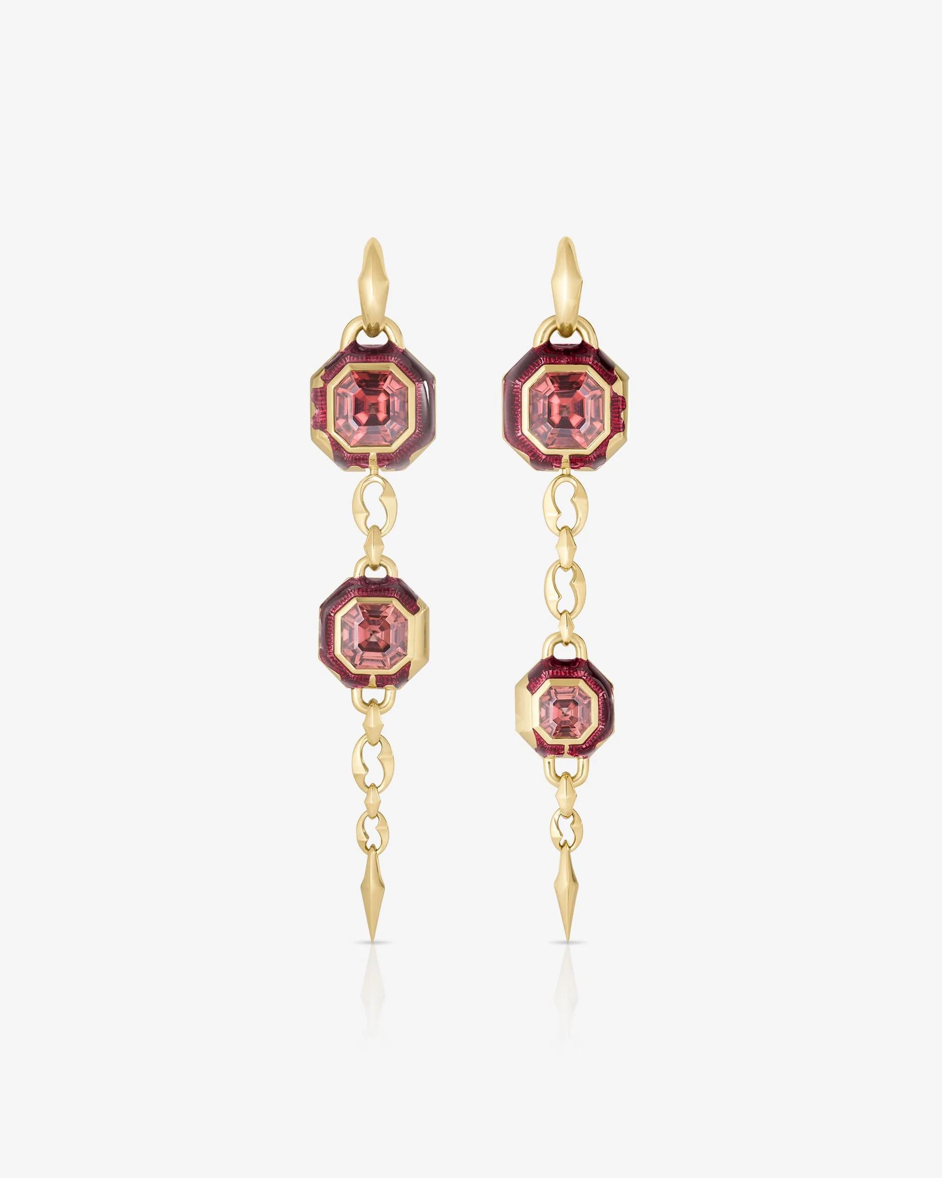 Pair of long yellow gold drop earrings set with octagonal pink zircons, surrounded by deep pink enamel and joined by articulated links