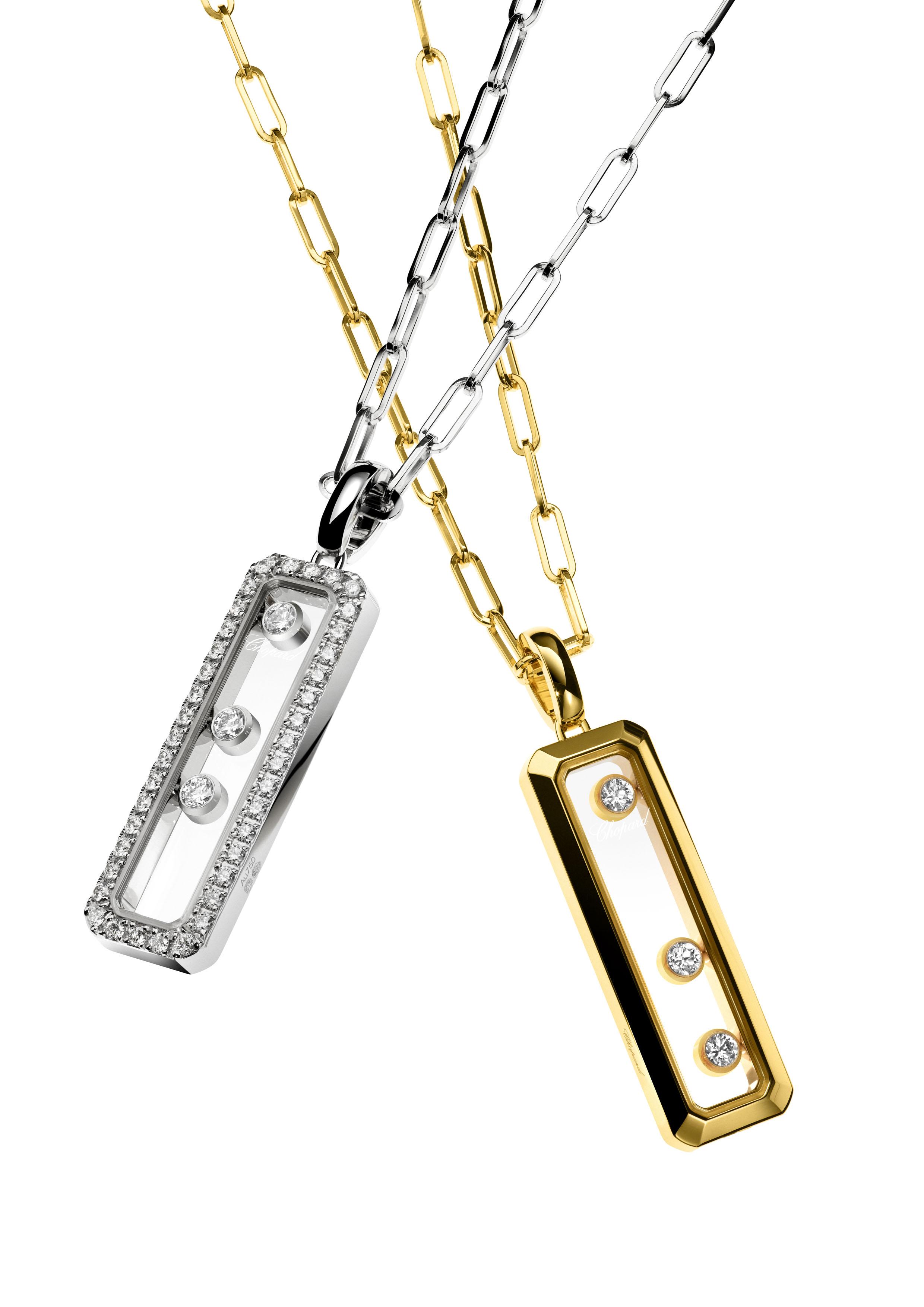 Yellow and white gold Chopard rectangular pendants, each containing three moving diamonds between sapphire crystals, suspended from elongated-link chains