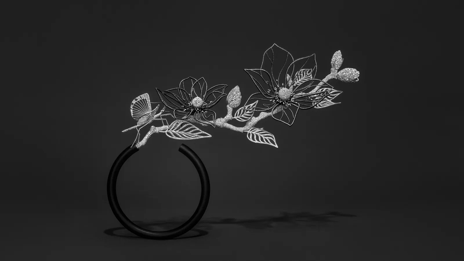 Composition N°2 features a magnolia and stick insect brought to life in transformable white gold and titanium jewels. Picture courtesy of Boucheron