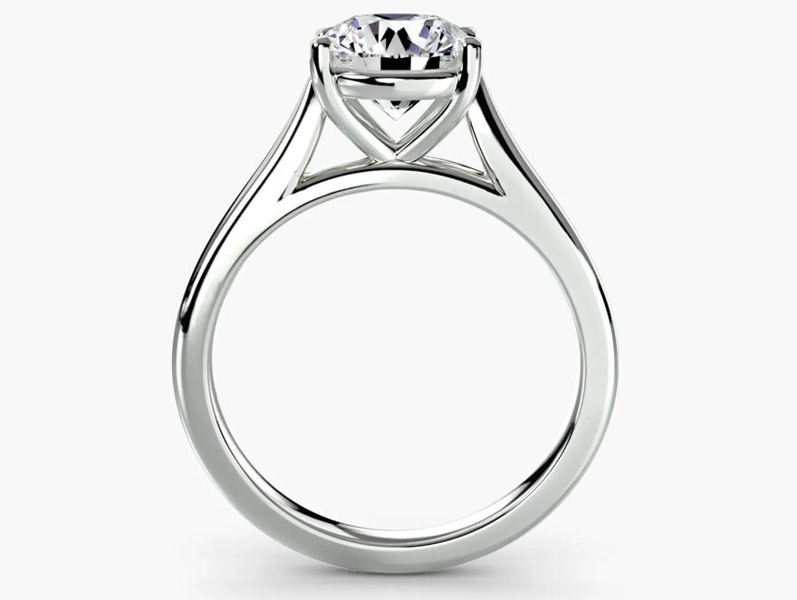 Side-profile render of a diamond solitaire ring created through Nivoda&rsquo;s jewellery platform, highlighting the ring&rsquo;s setting, gallery and band structure.
