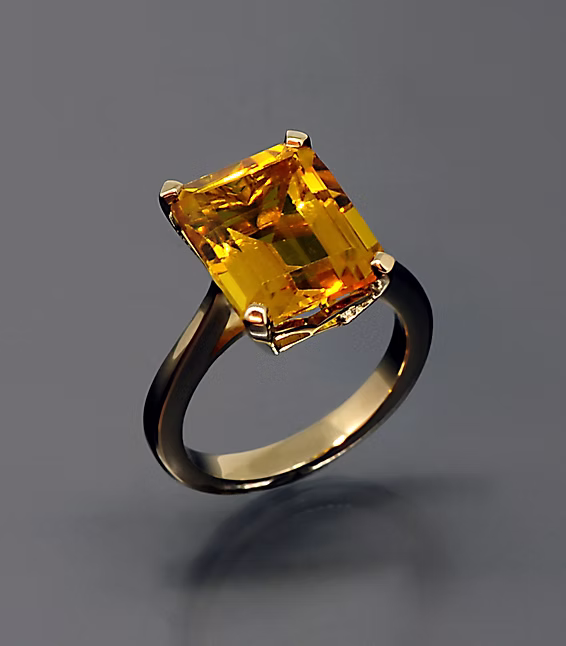  3ct Citrine Ring This 3ct citrine has simplicity yet classic all over it. In a traditional 4 claw setting set in 18kt Yellow gold.