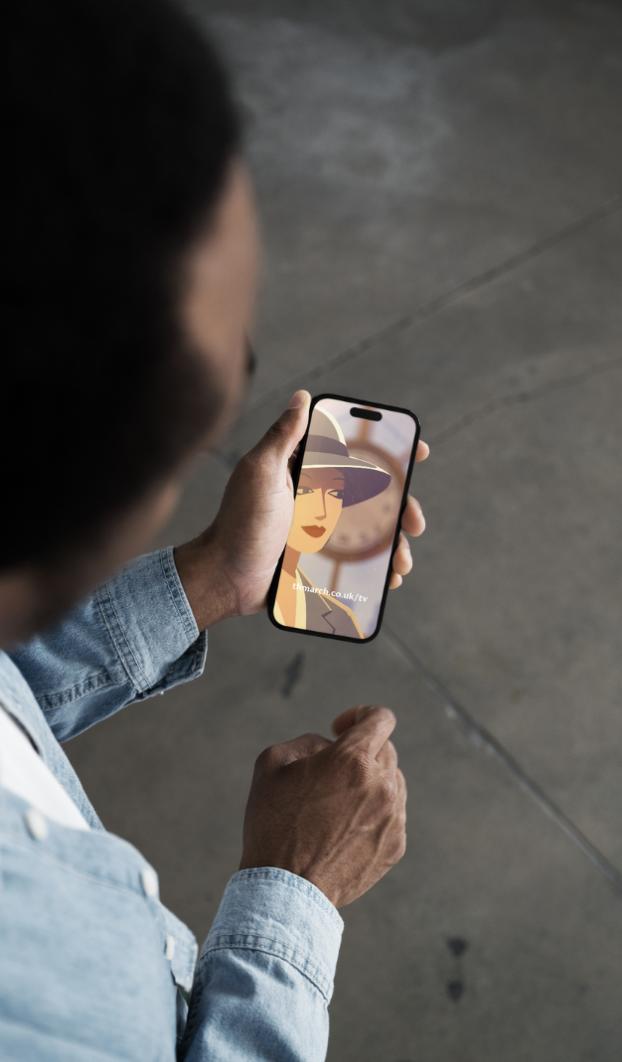 A person watches the animated TH March jewellery and watch insurance campaign on a smartphone.