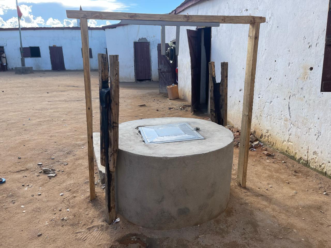 Another view of the completed well, located on school grounds and providing essential access to safe water for students