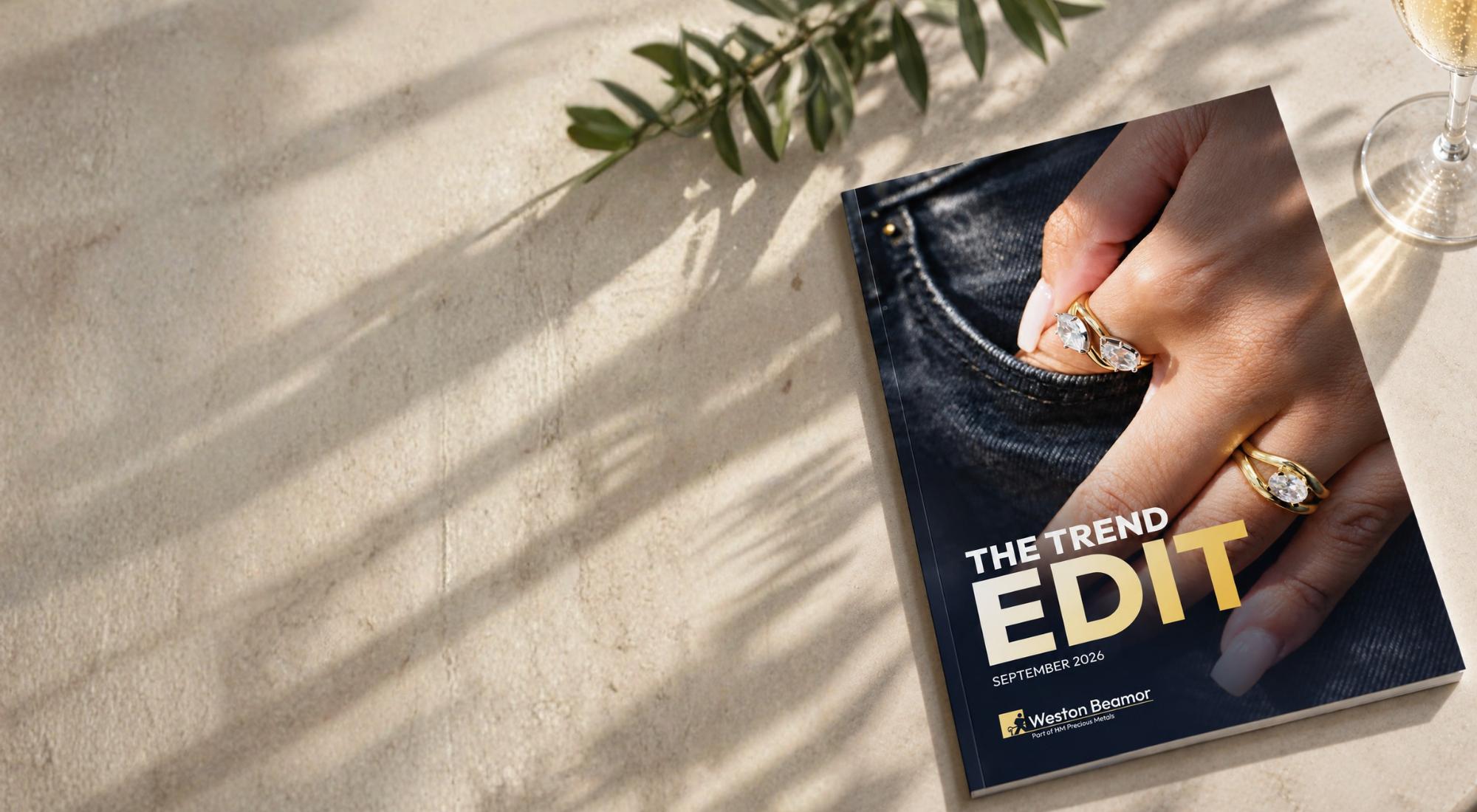 Cover of Weston Beamor’s September 2026 Trend Edit featuring a hand wearing contemporary yellow gold diamond rings.