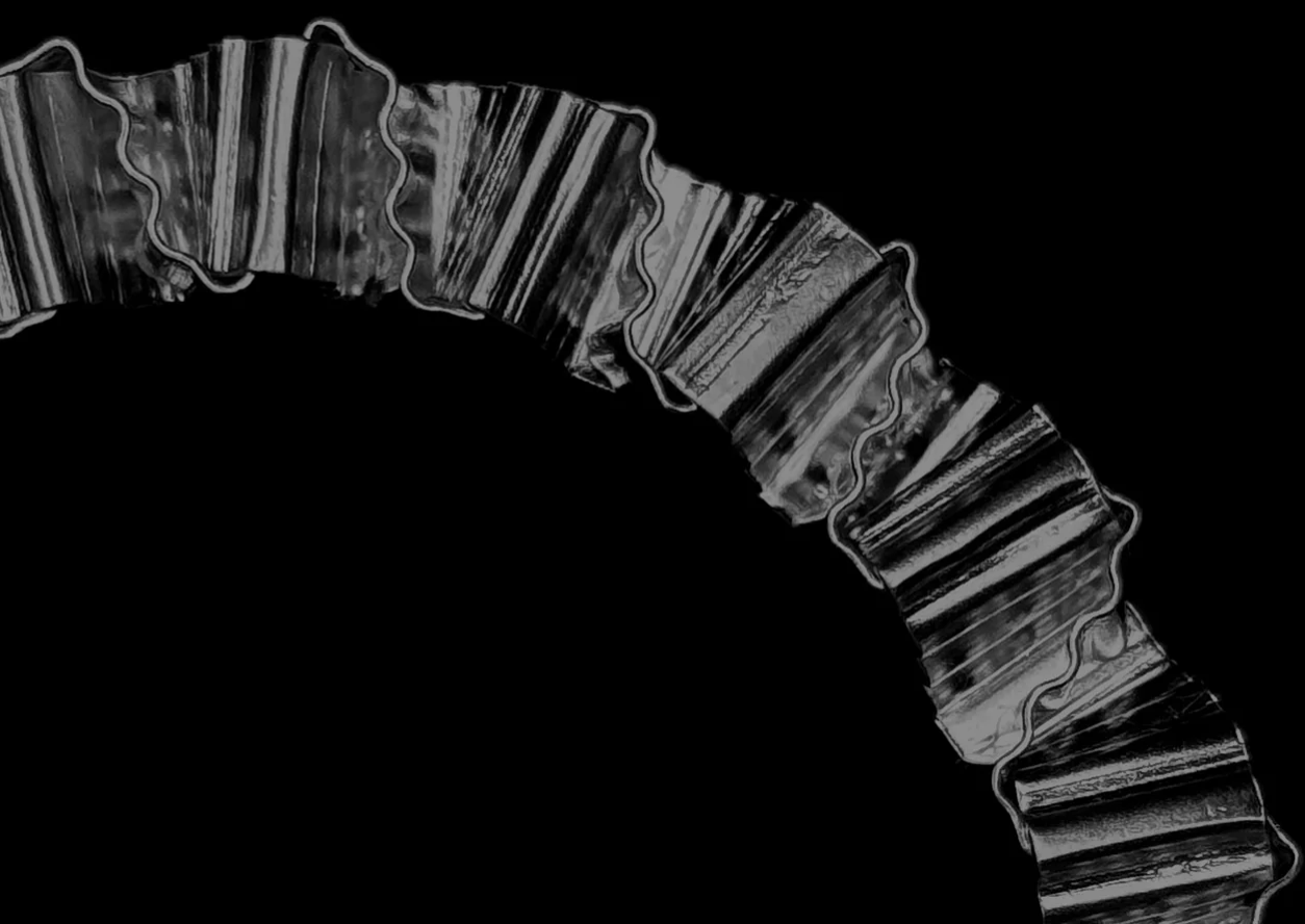 Caitlin Murphy is a third-generation Northern Irish silversmith whose folded, woven metal forms draw on geometry, paper models and optical illusion.  Imagery: Courtesy of Dover Street Market